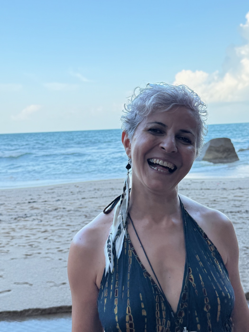 Kiyanoush smiling on the beach